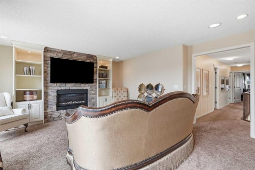 160 Brightoncrest Manor Se, Calgary, AB - Indoor Photo Showing Living Room With Fireplace