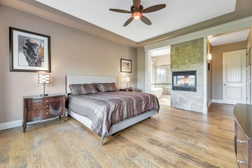 16 Heaver Gate, Rural Foothills County, AB - Indoor Photo Showing Bedroom