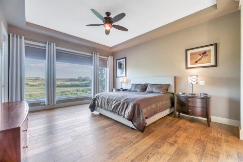 16 Heaver Gate, Rural Foothills County, AB - Indoor Photo Showing Bedroom