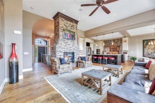 16 Heaver Gate, Rural Foothills County, AB - Indoor Photo Showing Living Room With Fireplace