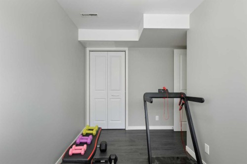 172 Rundlefield Crescent Ne, Calgary, AB - Indoor Photo Showing Gym Room