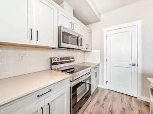 110-30 Sage Hill Walk Nw, Calgary, AB - Indoor Photo Showing Kitchen
