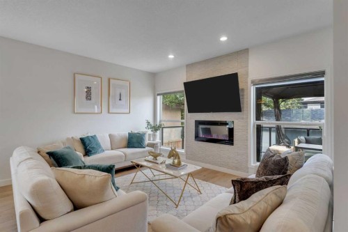 3409 2 Street Nw, Calgary, AB - Indoor Photo Showing Living Room With Fireplace