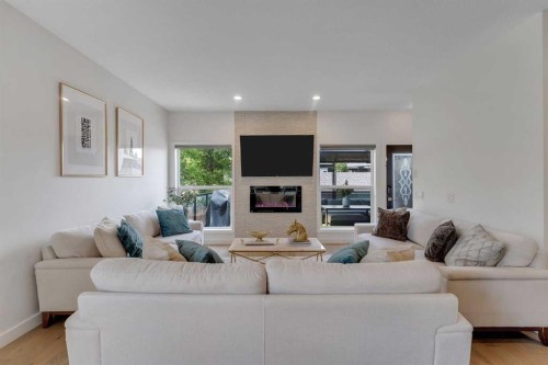 3409 2 Street Nw, Calgary, AB - Indoor Photo Showing Living Room With Fireplace