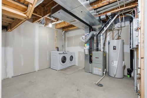 1404 Auburn Bay Square, Calgary, AB - Indoor Photo Showing Laundry Room