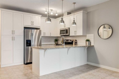 3109-522 Cranford Drive Se, Calgary, AB - Indoor Photo Showing Kitchen With Stainless Steel Kitchen With Upgraded Kitchen