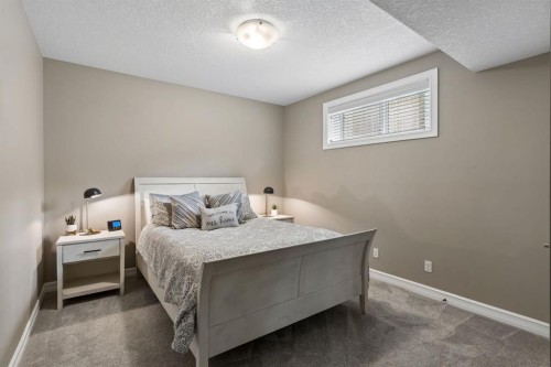46 Aspenshire Place Sw, Calgary, AB - Indoor Photo Showing Bedroom