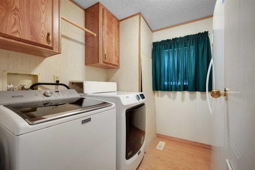 169 Erin Woods Circle Se, Calgary, AB - Indoor Photo Showing Laundry Room
