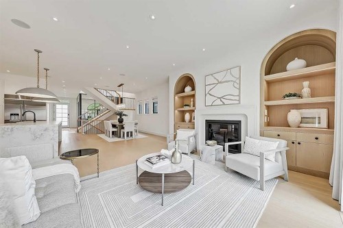 623 18 Avenue Nw, Calgary, AB - Indoor Photo Showing Living Room With Fireplace