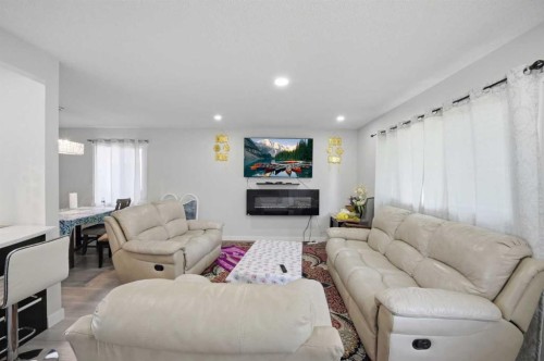 731 Maryvale Way Ne, Calgary, AB - Indoor Photo Showing Living Room