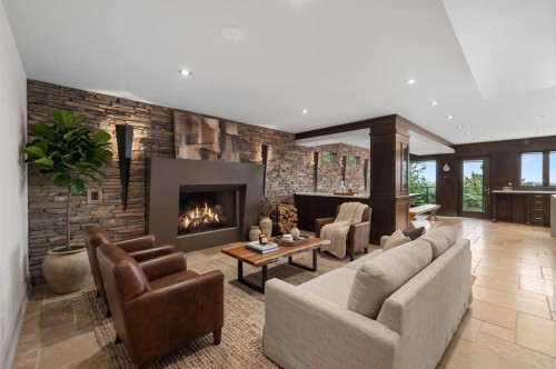 2724 Signal Ridge View Sw, Calgary, AB - Indoor Photo Showing Living Room With Fireplace