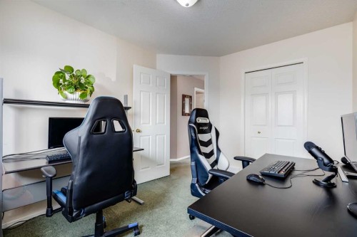 152 Covewood Green Ne, Calgary, AB - Indoor Photo Showing Gym Room