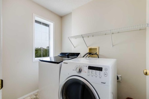 152 Covewood Green Ne, Calgary, AB - Indoor Photo Showing Laundry Room