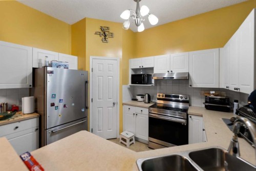 5036 Martin Crossing Drive Ne, Calgary, AB - Indoor Photo Showing Kitchen With Stainless Steel Kitchen With Double Sink
