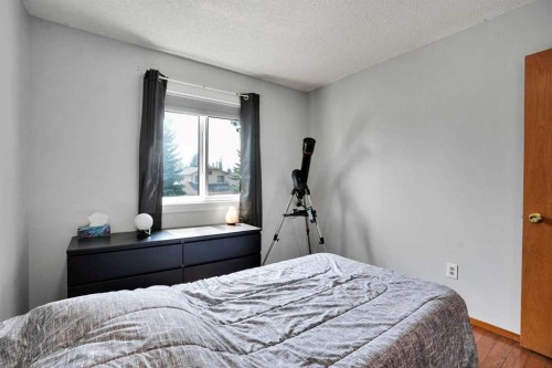 16 Sun Harbour Crescent Se, Calgary, AB - Indoor Photo Showing Bedroom
