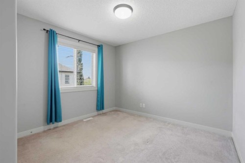7 Copperleaf Terrace Se, Calgary, AB - Indoor Photo Showing Other Room