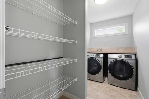 7 Copperleaf Terrace Se, Calgary, AB - Indoor Photo Showing Laundry Room
