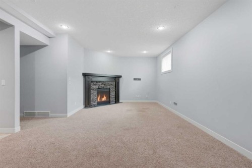 7 Copperleaf Terrace Se, Calgary, AB - Indoor With Fireplace