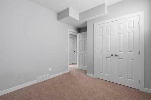 7 Copperleaf Terrace Se, Calgary, AB - Indoor Photo Showing Other Room