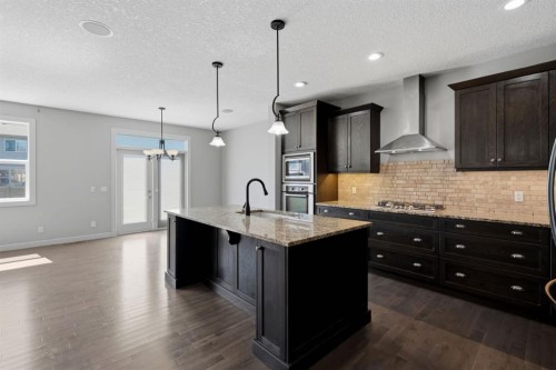 7 Copperleaf Terrace Se, Calgary, AB - Indoor Photo Showing Kitchen With Upgraded Kitchen