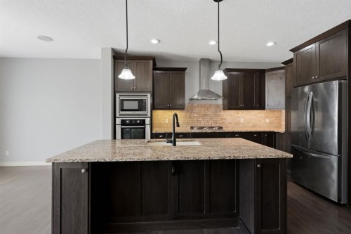 7 Copperleaf Terrace Se, Calgary, AB - Indoor Photo Showing Kitchen With Stainless Steel Kitchen With Upgraded Kitchen
