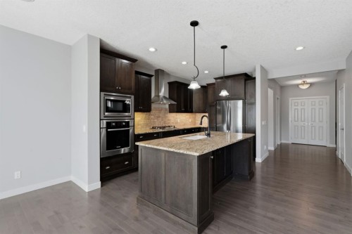 7 Copperleaf Terrace Se, Calgary, AB - Indoor Photo Showing Kitchen With Stainless Steel Kitchen With Upgraded Kitchen