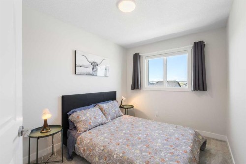 251 Lucas Boulevard Nw, Calgary, AB - Indoor Photo Showing Bedroom