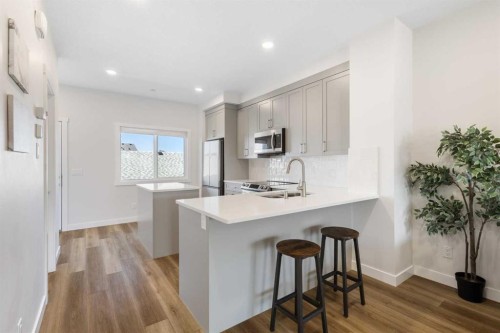 251 Lucas Boulevard Nw, Calgary, AB - Indoor Photo Showing Kitchen With Upgraded Kitchen