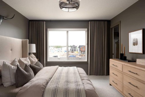 198 Starling Boulevard Nw, Calgary, AB - Indoor Photo Showing Bedroom