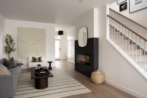198 Starling Boulevard Nw, Calgary, AB - Indoor With Fireplace
