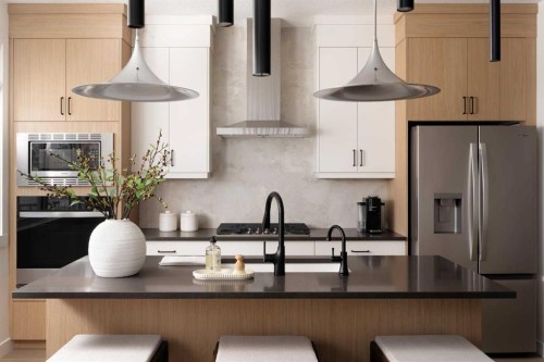 198 Starling Boulevard Nw, Calgary, AB - Indoor Photo Showing Kitchen With Upgraded Kitchen