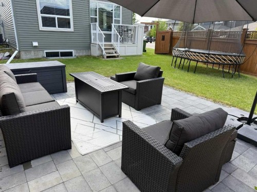 100 Kinniburgh Gardens, Chestermere, AB - Outdoor With Deck Patio Veranda With Exterior