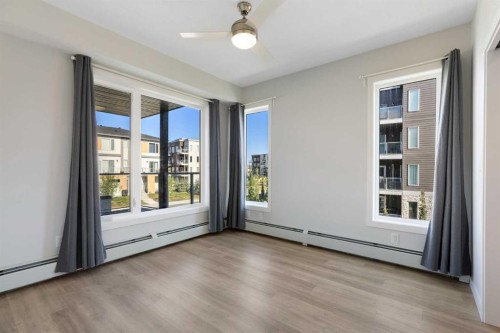 202-150 Shawnee Square Sw, Calgary, AB - Indoor Photo Showing Other Room