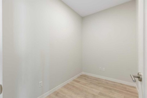 202-150 Shawnee Square Sw, Calgary, AB - Indoor Photo Showing Other Room