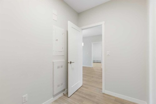 202-150 Shawnee Square Sw, Calgary, AB - Indoor Photo Showing Other Room
