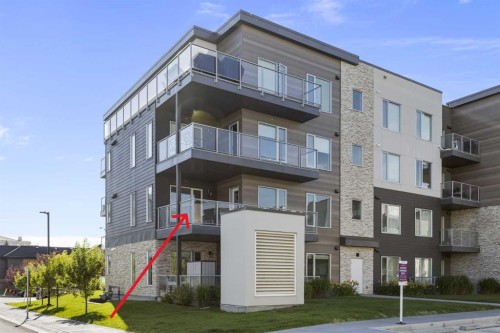 202-150 Shawnee Square Sw, Calgary, AB - Outdoor With Balcony With Facade
