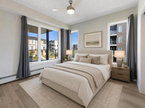 202-150 Shawnee Square Sw, Calgary, AB - Indoor Photo Showing Bedroom