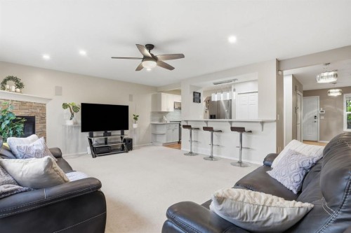 450 Elgin Way Se, Calgary, AB - Indoor With Fireplace