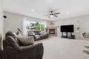 450 Elgin Way Se, Calgary, AB  - Indoor With Fireplace 