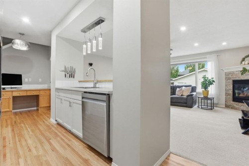 450 Elgin Way Se, Calgary, AB - Indoor With Fireplace