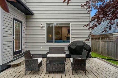 100 Fairways Drive Nw, Airdrie, AB - Outdoor With Deck Patio Veranda With Exterior