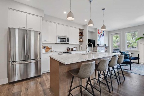 2-1936 25A Street Sw, Calgary, AB - Indoor Photo Showing Kitchen With Stainless Steel Kitchen With Upgraded Kitchen