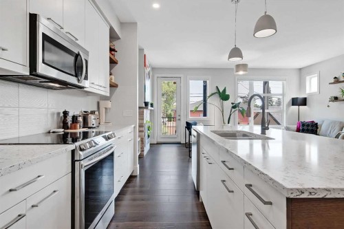 2-1936 25A Street Sw, Calgary, AB - Indoor Photo Showing Kitchen With Double Sink With Upgraded Kitchen
