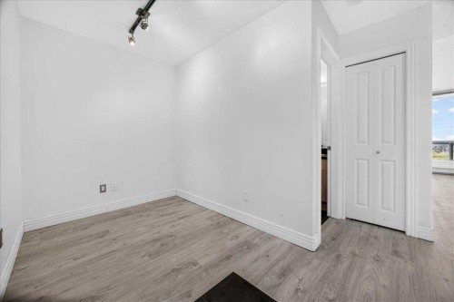 904-55 Spruce Place Sw, Calgary, AB - Indoor Photo Showing Other Room