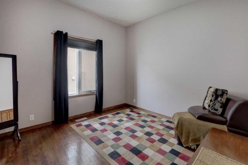 321 Gleneagles View, Cochrane, AB - Indoor Photo Showing Bedroom