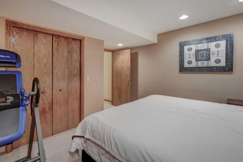 321 Gleneagles View, Cochrane, AB - Indoor Photo Showing Bedroom