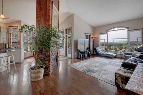 321 Gleneagles View, Cochrane, AB - Indoor Photo Showing Living Room