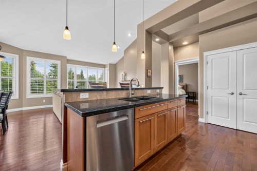 66 Evercreek Bluffs View Sw, Calgary, AB - Indoor Photo Showing Kitchen With Double Sink