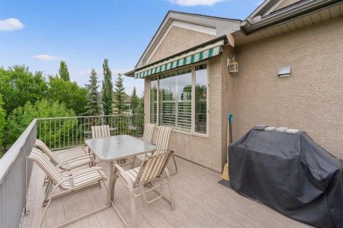 66 Evercreek Bluffs View Sw, Calgary, AB - Outdoor With Deck Patio Veranda With Exterior