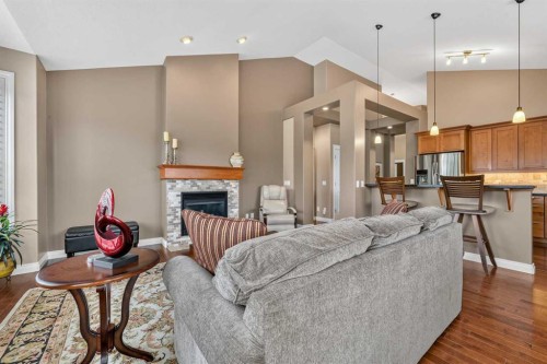 66 Evercreek Bluffs View Sw, Calgary, AB - Indoor With Fireplace